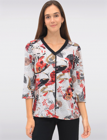 Top en maille à col en V imprimé et vibrant, doté de bordures contrastées, de manches 3/4 et d'un ourlet arrondi, dans un motif floral et abstrait multicolore signé Manteaux Manteaux.
