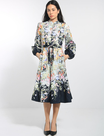 Stella Morgan Long Sleeve Mock Collar Belted Midi Dress adorned with vibrant floral patterns, featuring a hidden back zipper, front pockets, and A-line design with pastel blooms.